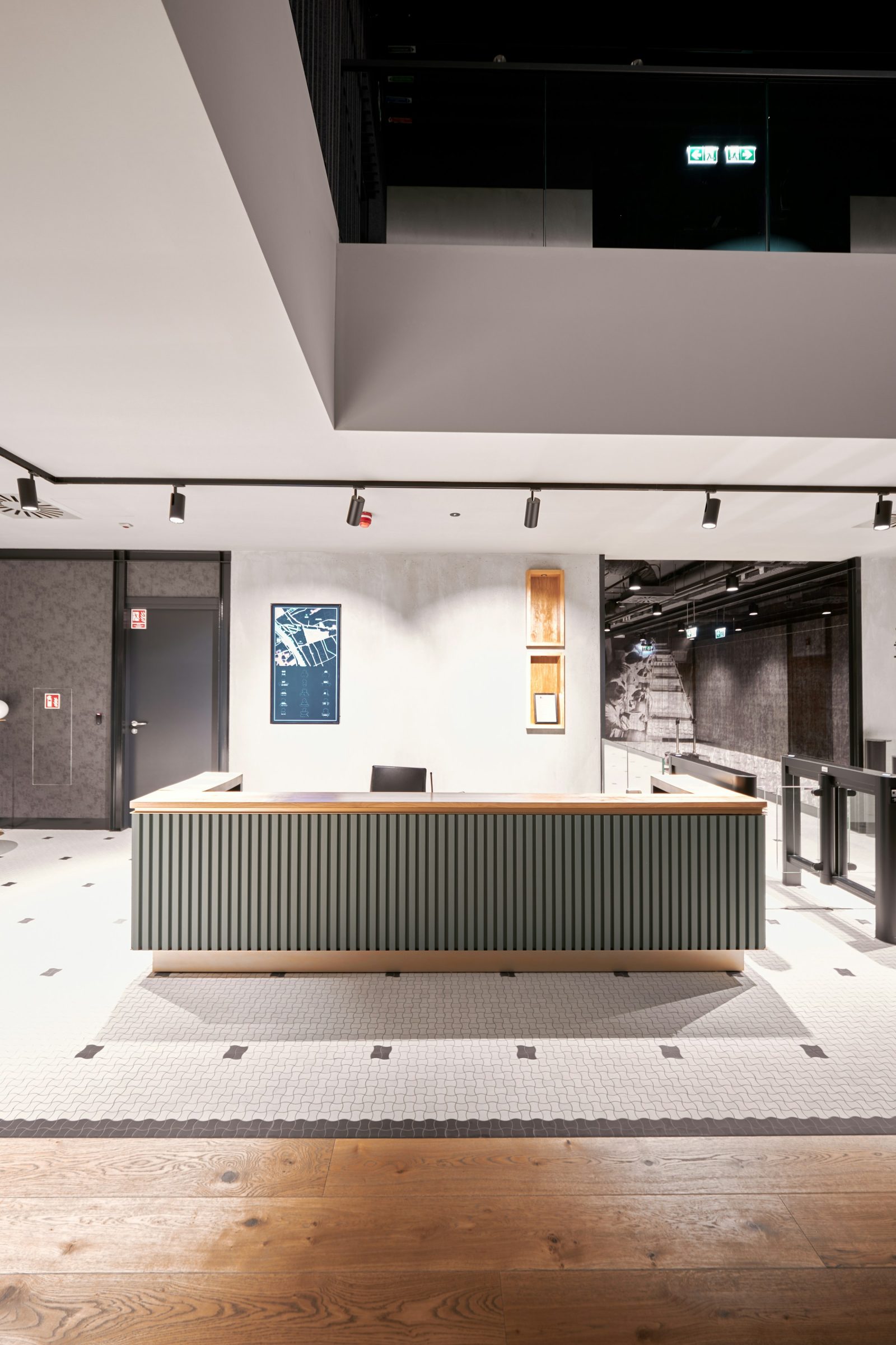 A bright institutional office with a public service counter